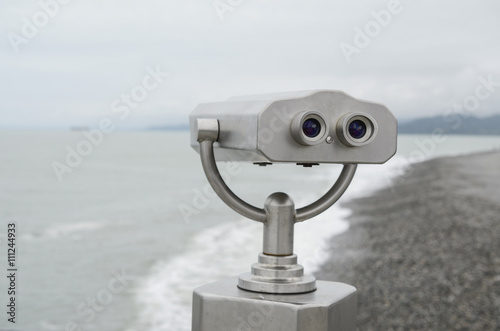 Binoculars with wonderful view, gray binoculars for viewing, sea