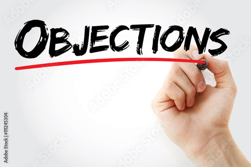 Hand writing Objections with marker, business concept background photo