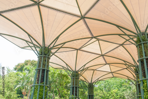 Inside of fabric roof structure stadium with plant in metal stru photo