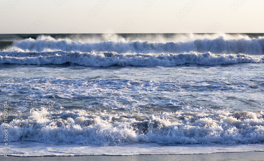 The waves of the Pacific ocean, the beach landscape. The ocean and waves during strong winds in United States, Santa Monica.