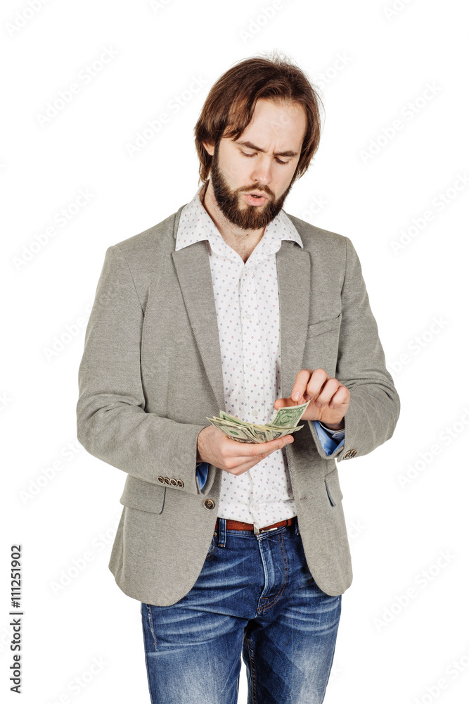 closeup portrait of young businessman holding and counts money closeup portrait of young businessman holding and counts money