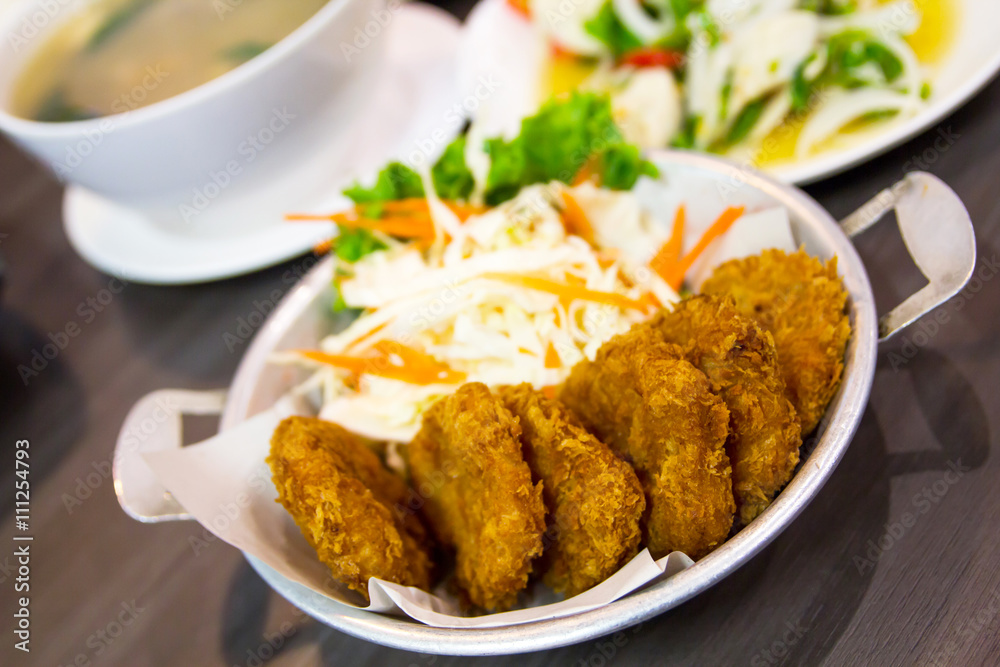 fried shrimp meat ball with sweet sauce on wooden table fried shrimp meat ball with sweet sauce on wooden table