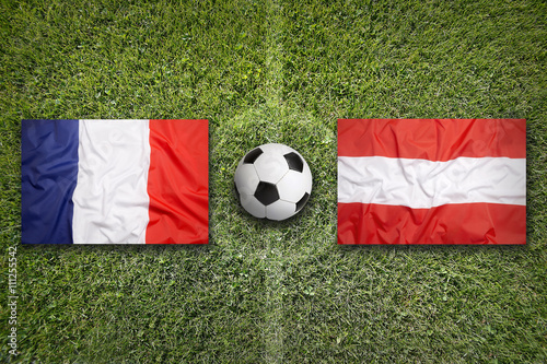 France vs. Austria flags on soccer field