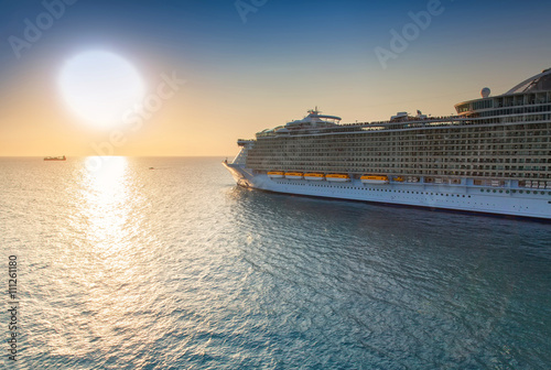 Cruise Ship Sailing at Sunset © Ruth P. Peterkin