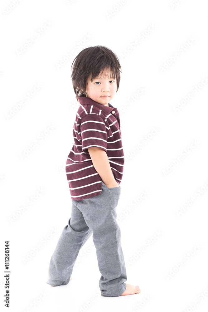 Little asian preschool boy standing isolated on white background Little asian preschool boy standing isolated on white background