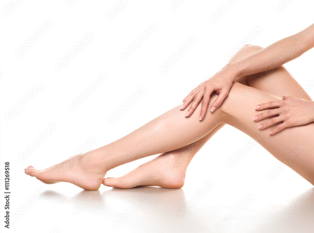 woman legs isolated on white. Depilation or another healths concept woman legs isolated on white. Depilation or another healths concept