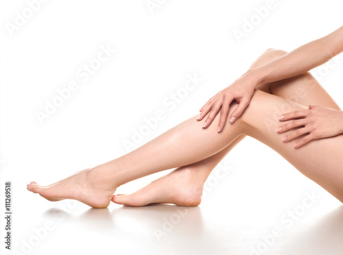 woman legs isolated on white. Depilation or another healths concept