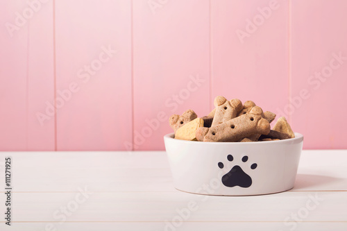 Dog food in a bowl filled with treats