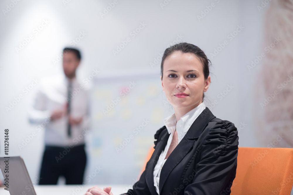 Fototapeta premium young business woman on meeting using laptop computer