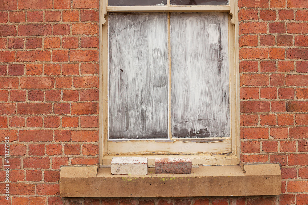 Fototapeta premium Window blocked out with white paint
