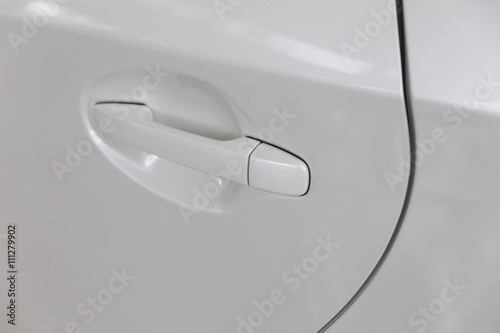 door handle of new white car