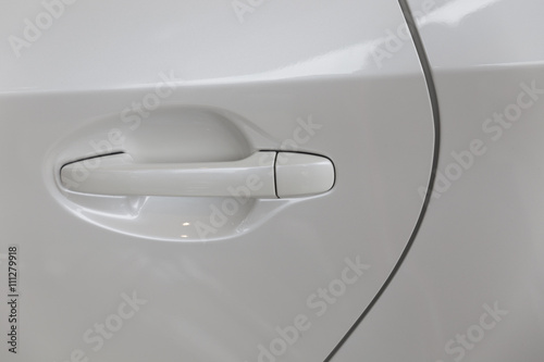 door handle of new white car