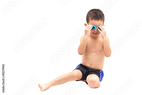 Portrait of little young boy in swimsuit