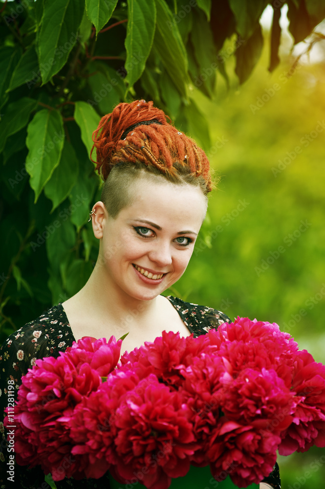 Foto de portrait of beautiful girl with peonies do Stock | Adobe Stock