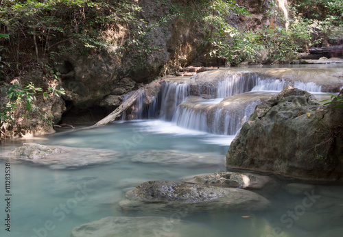 Fototapeta Naklejka Na Ścianę i Meble -  Green Waterfall in Tropical Rainforest 