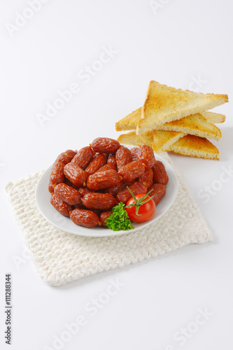 mini dry sausages and toast