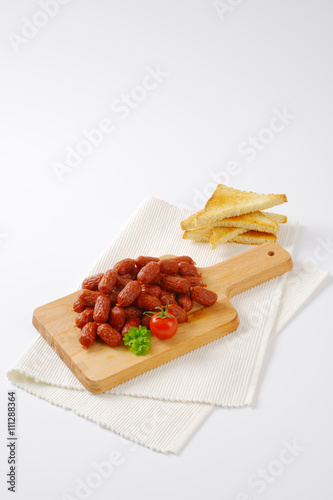 mini dry sausages and toast