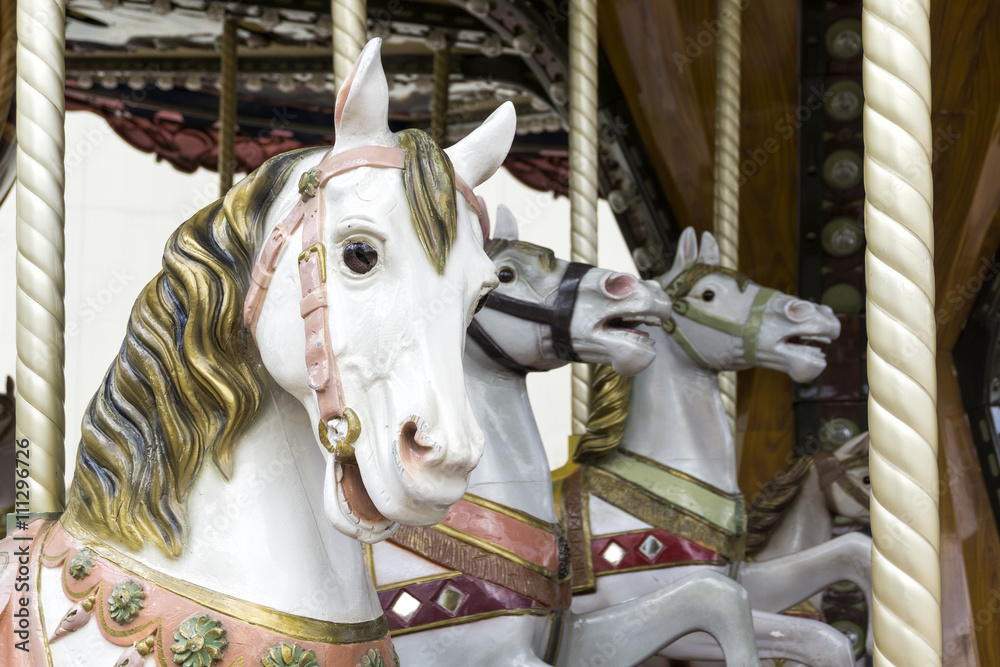 White carousel horses