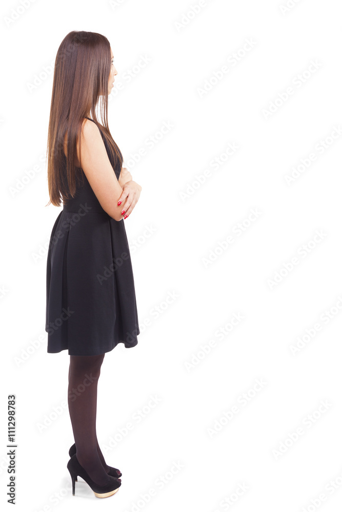 Woman standing looking at copy space, isolated on white backgrou Woman standing looking at copy space, isolated on white backgrou