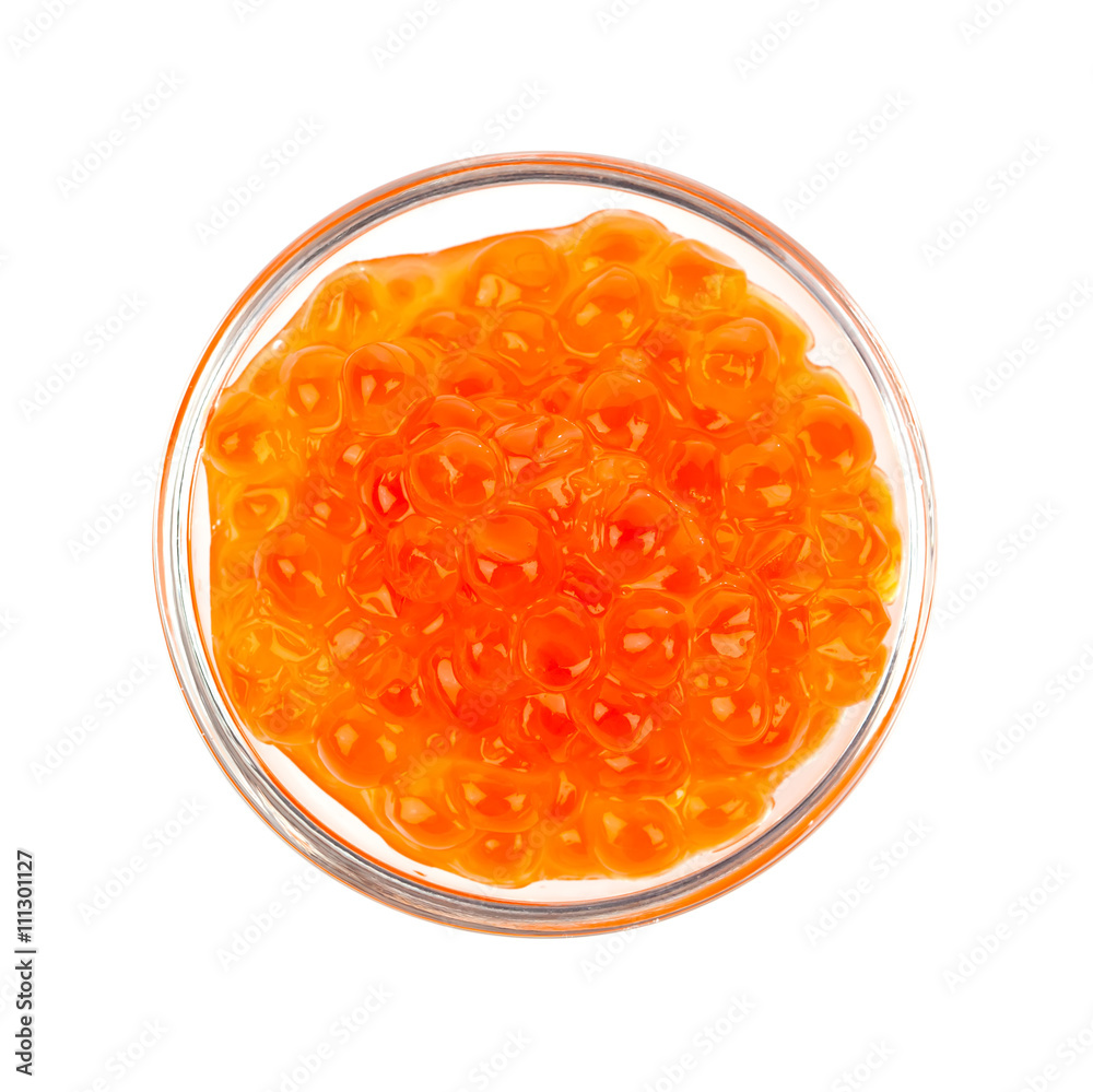 Red caviar in the glass bowl isolated on a white background. Red caviar in the glass bowl isolated on a white background.