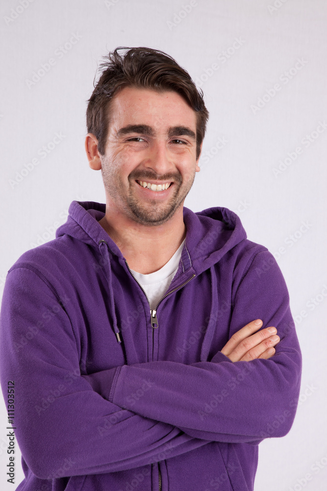 Smiling man with arms folded Smiling man with arms folded