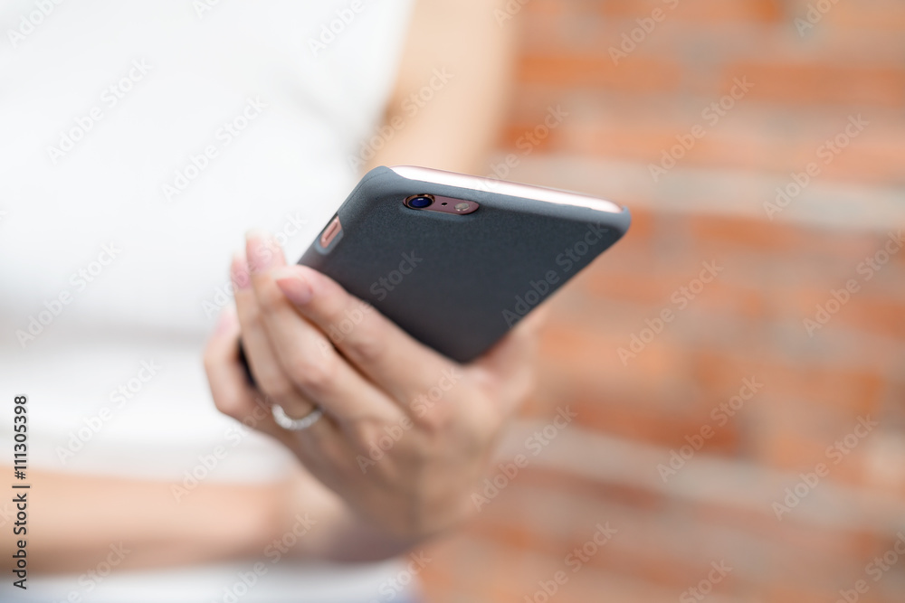 Woman hand hold with phone