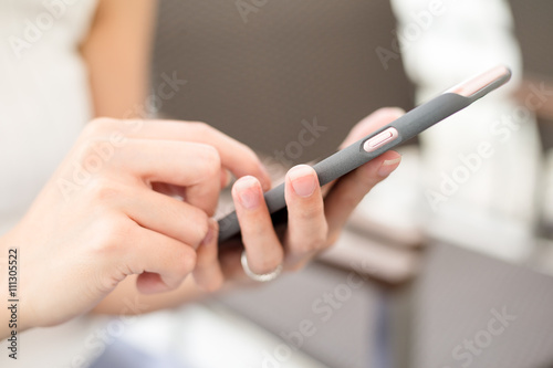 Woman browse internet on mobile phone
