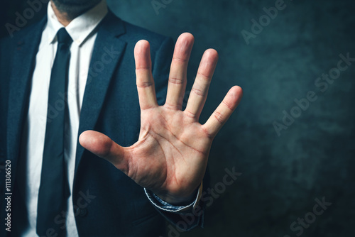 Businessman with long fingers photo