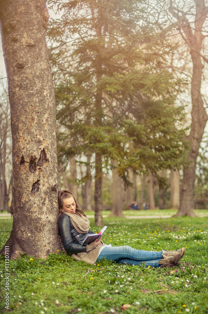 Young woman reading book Young woman reading book