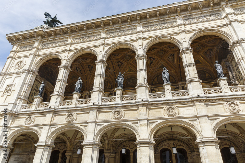 Statues adorn the building of the Vienna State Opera