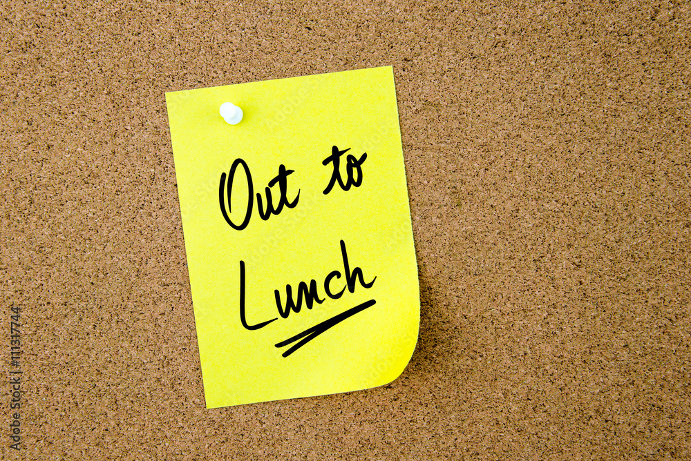Out To Lunch written on yellow paper note