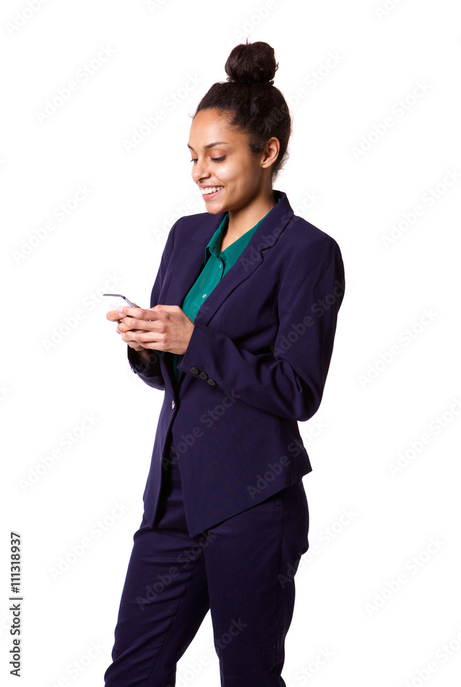 Smiling young african business woman using mobile phone