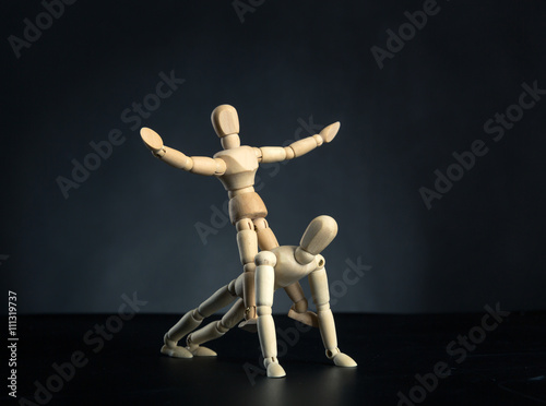 Woman sitting on the man's back
