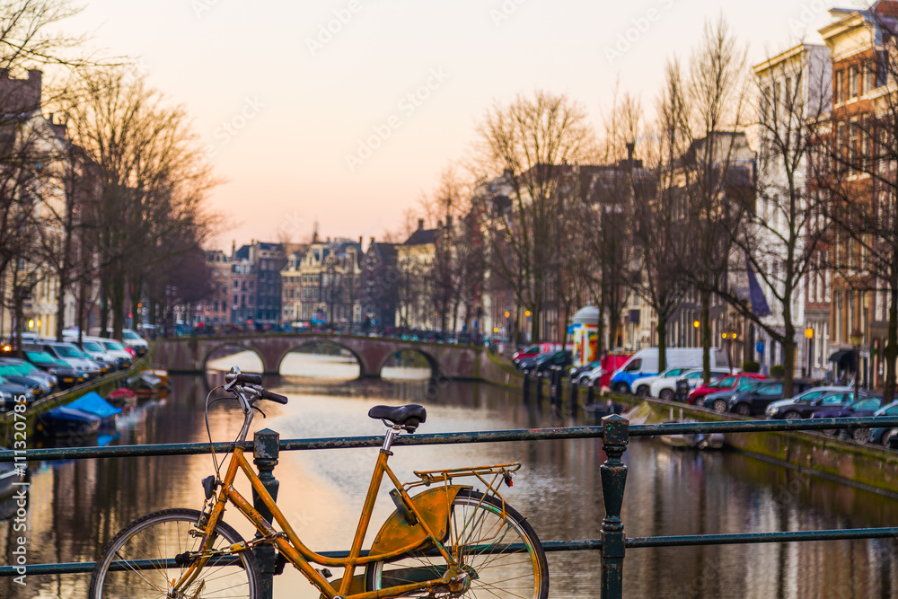 Bikes, Buildings and Boats in Amsterdam at Dawn
