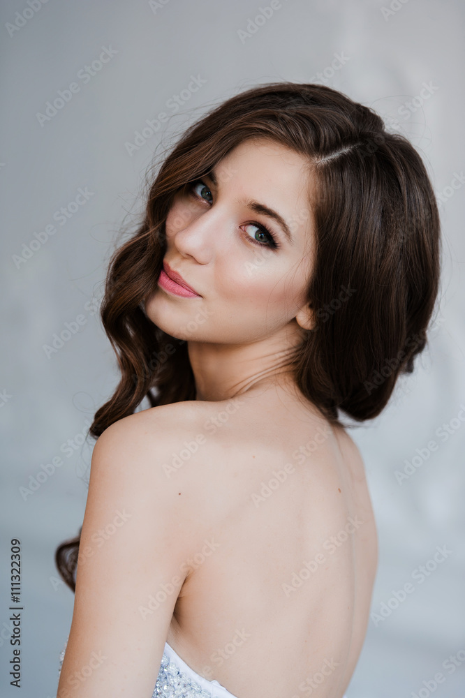 Portrait of a beautiful bride with bright makeup