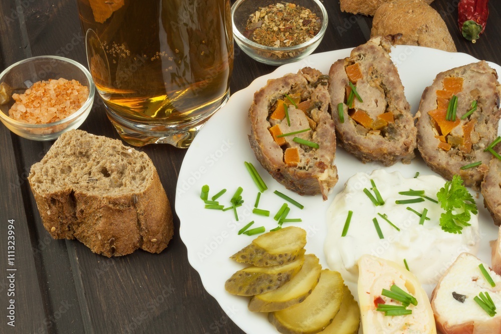 Baked roll with minced meat, cheese rolls and mayonnaise. Homework refreshments at the party.
Baked roll with minced meat, cheese rolls and mayonnaise. Homework refreshments at the party.