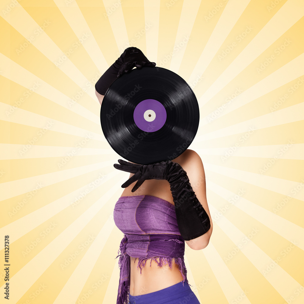 Behind purple vinyl / Colorful photo of a sexy girl, hiding behind a purple  LP microgroove vinyl record on colorful abstract cartoon style background.  Stock Photo | Adobe Stock