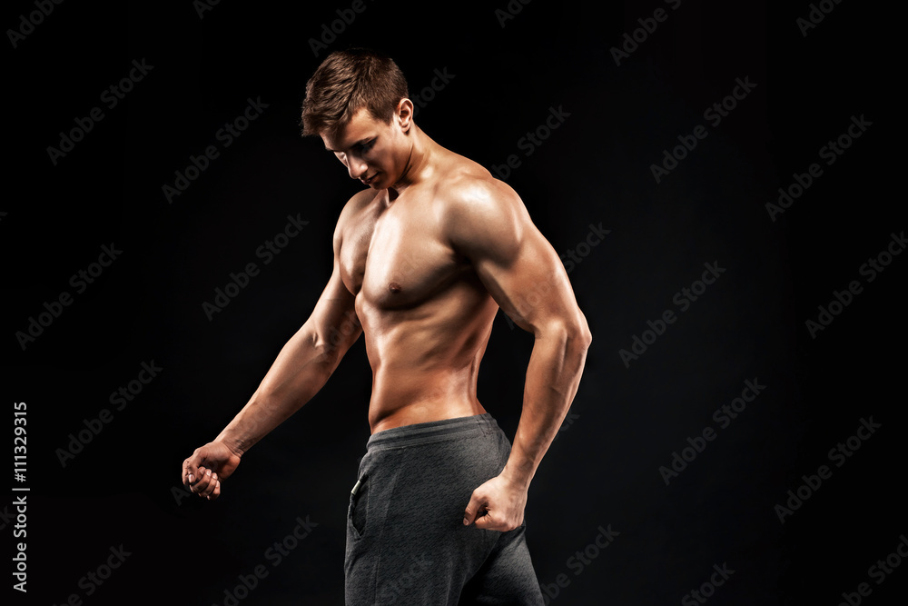 Fototapeta premium Image of very muscular man posing with naked torso