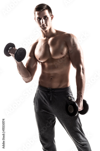 Muscular man doing exercises with dumbbells isolated on white background