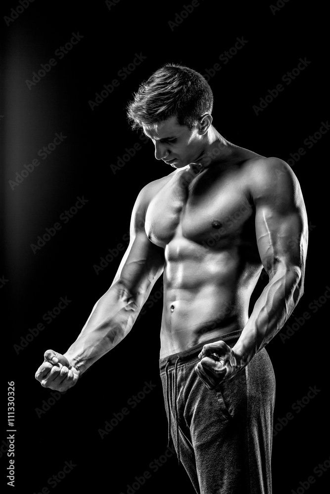 Naklejka premium Image of very muscular man posing with naked torso