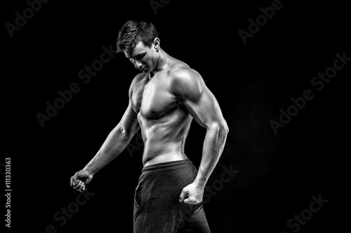 Image of very muscular man posing with naked torso © nazarovsergey