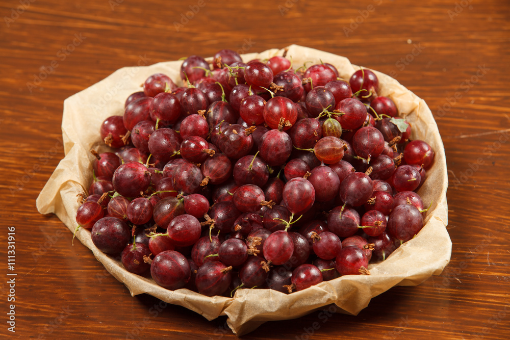Gooseberry on a wooden table Gooseberry on a wooden table