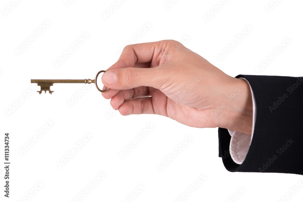 businessman hand holding gold skeleton key isolated on white bac businessman hand holding gold skeleton key isolated on white bac