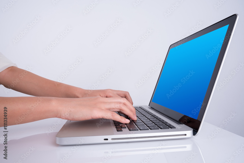 woman hand using laptop woman hand using laptop