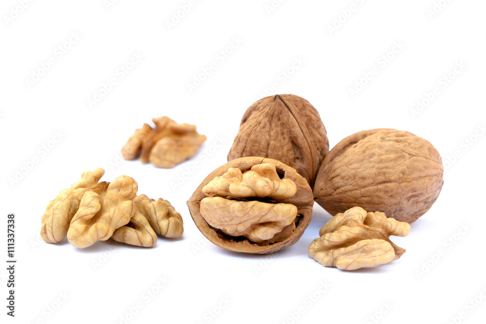 Pile of walnuts isolated on white background Pile of walnuts isolated on white background