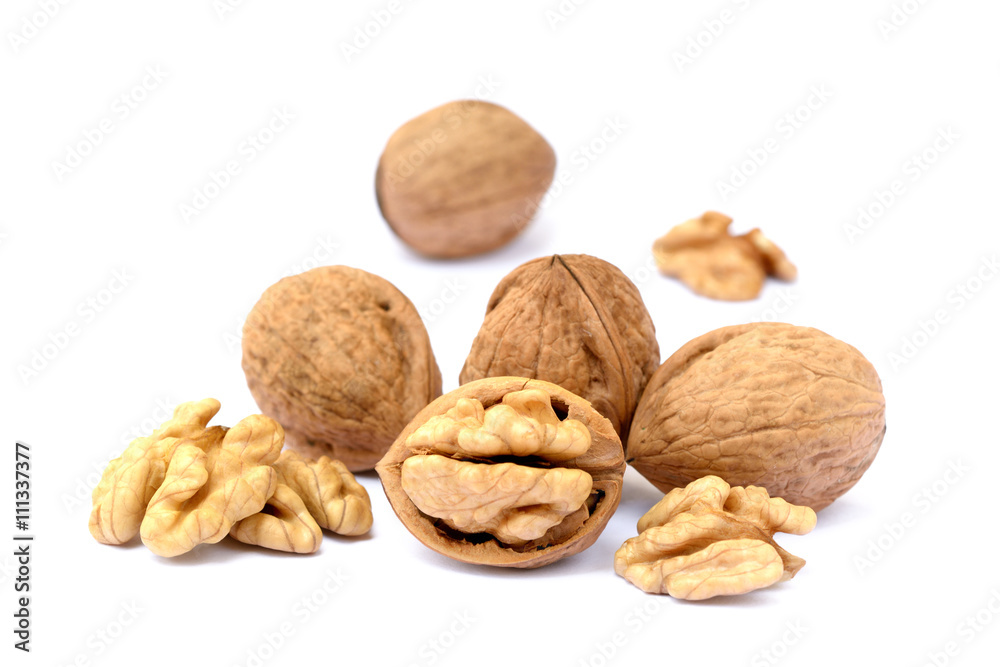Pile of walnuts isolated on white background Pile of walnuts isolated on white background