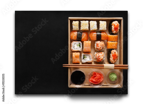 Set of sushi maki and rolls at box isolated.