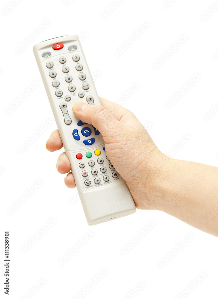 Remote control in hand on an isolated background Remote control in hand on an isolated background