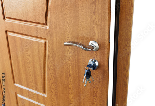 Obraz na płótnie Open brown wooden door handle with lock. w salonie