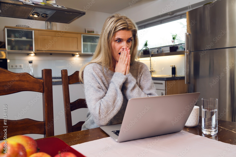 Ταπετσαρία Work from home woman with stunned facial expression at laptop